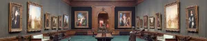 photo of the West Gallery of the Frick Collection with paintings and furniture